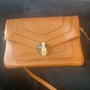 Brown BVLGARI bag.